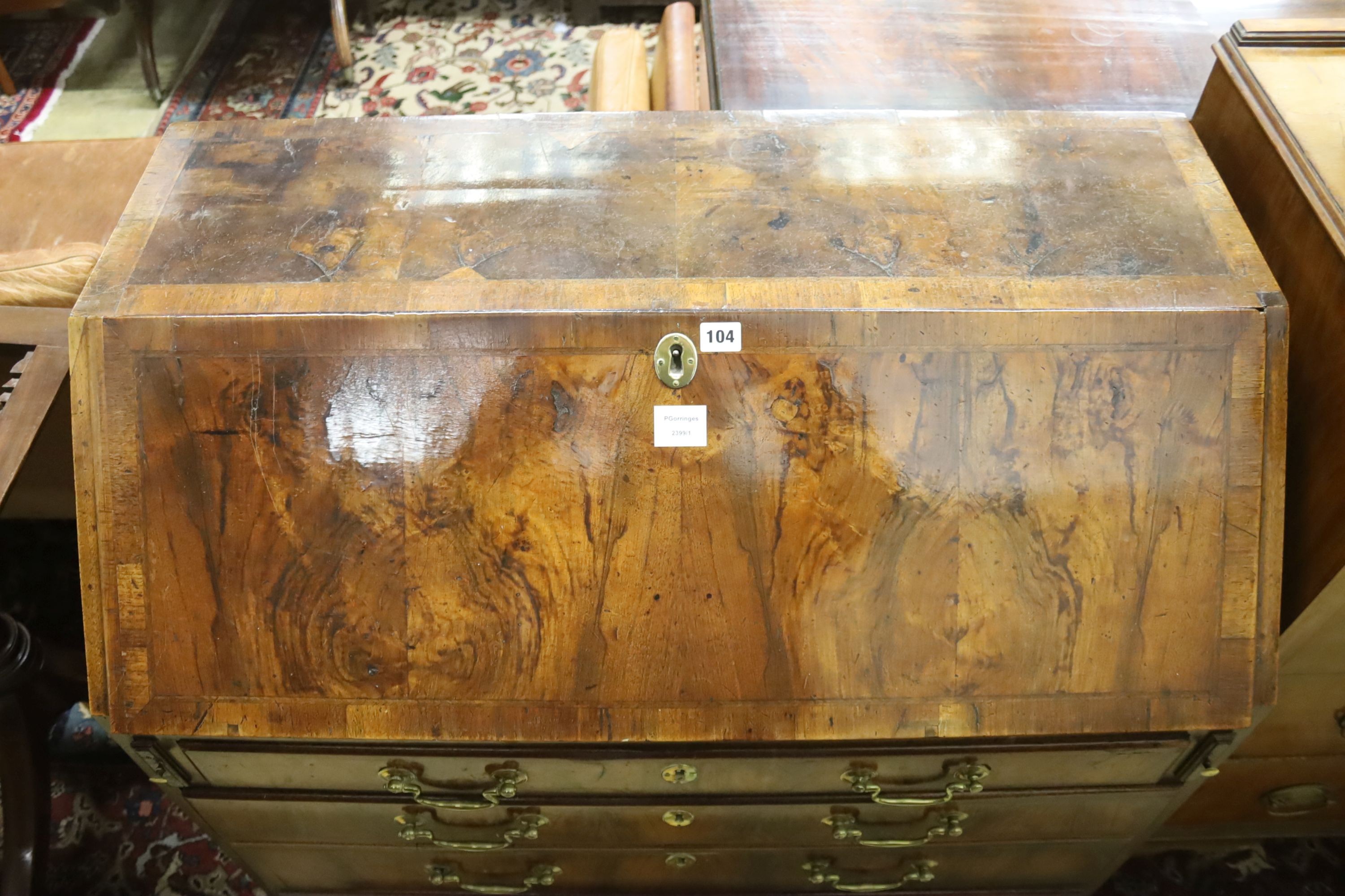 A George II figured walnut bureau, width 99cm, depth 53cm, height 98cm